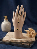 Gold-Tone Black Enamel Heart Slave Bracelet / Hand Chain